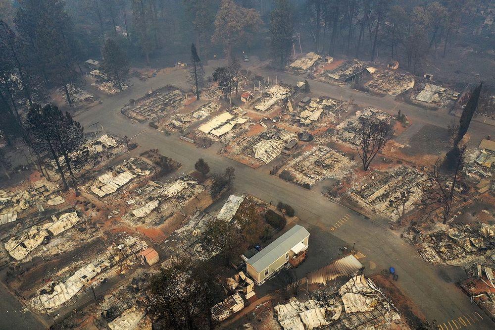 Image of buildings destroyed by a wildfire. 